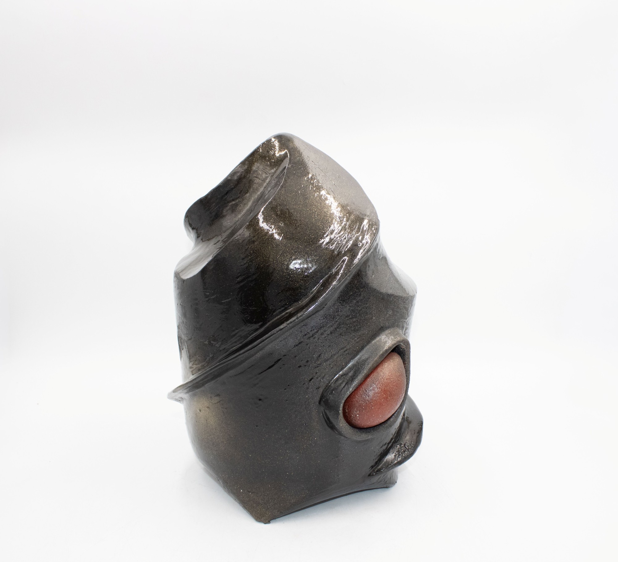 Ceramic vessel exploring visibility, absence, and the instability of home.