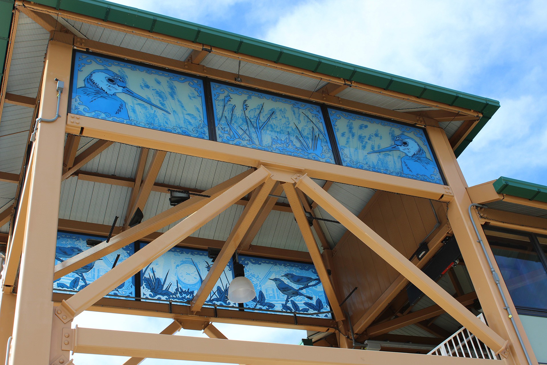 28 glass windows designed for the Arthur Kill Station