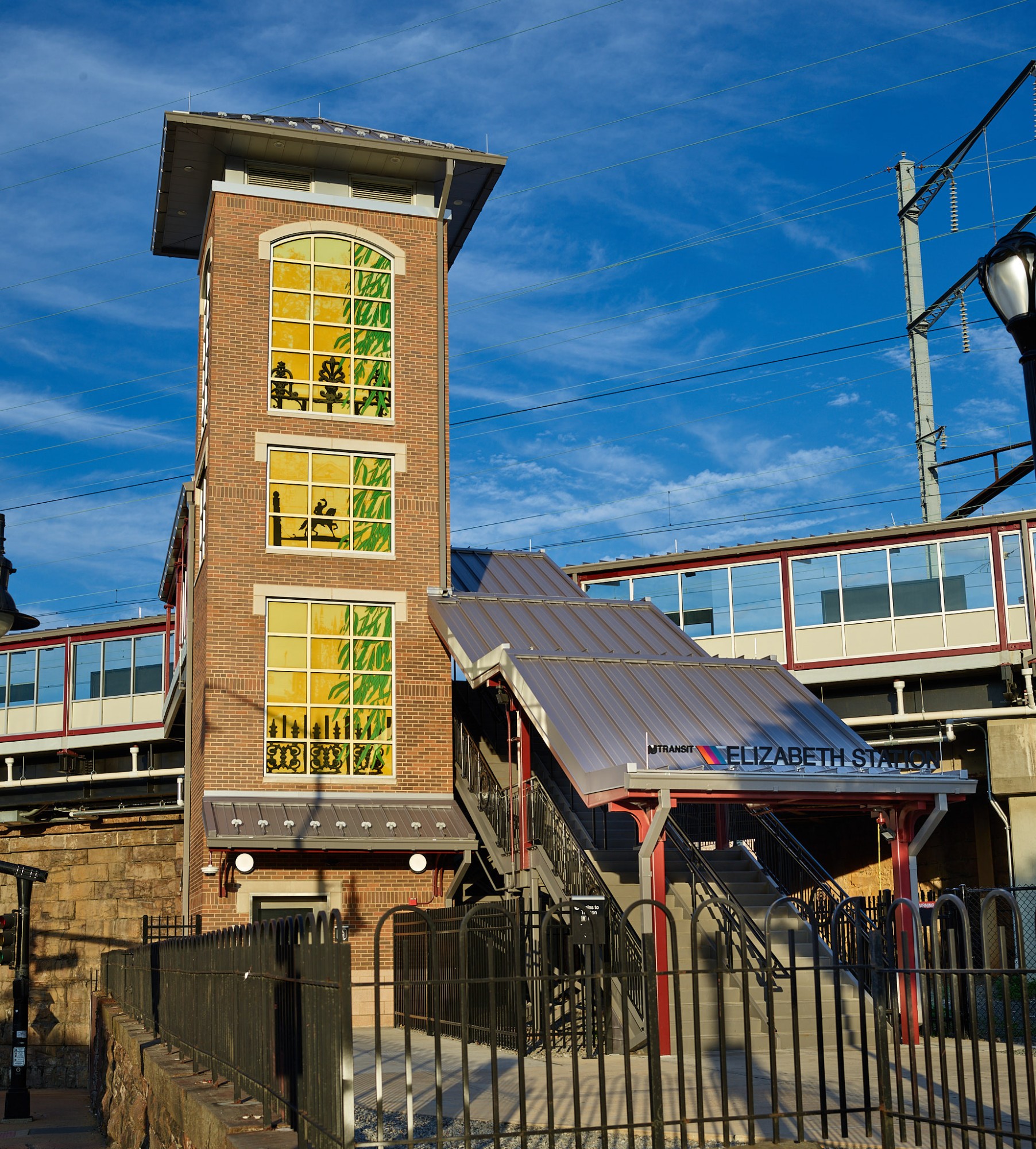 one of four glass elevator towers designed for the Elizabeth Station