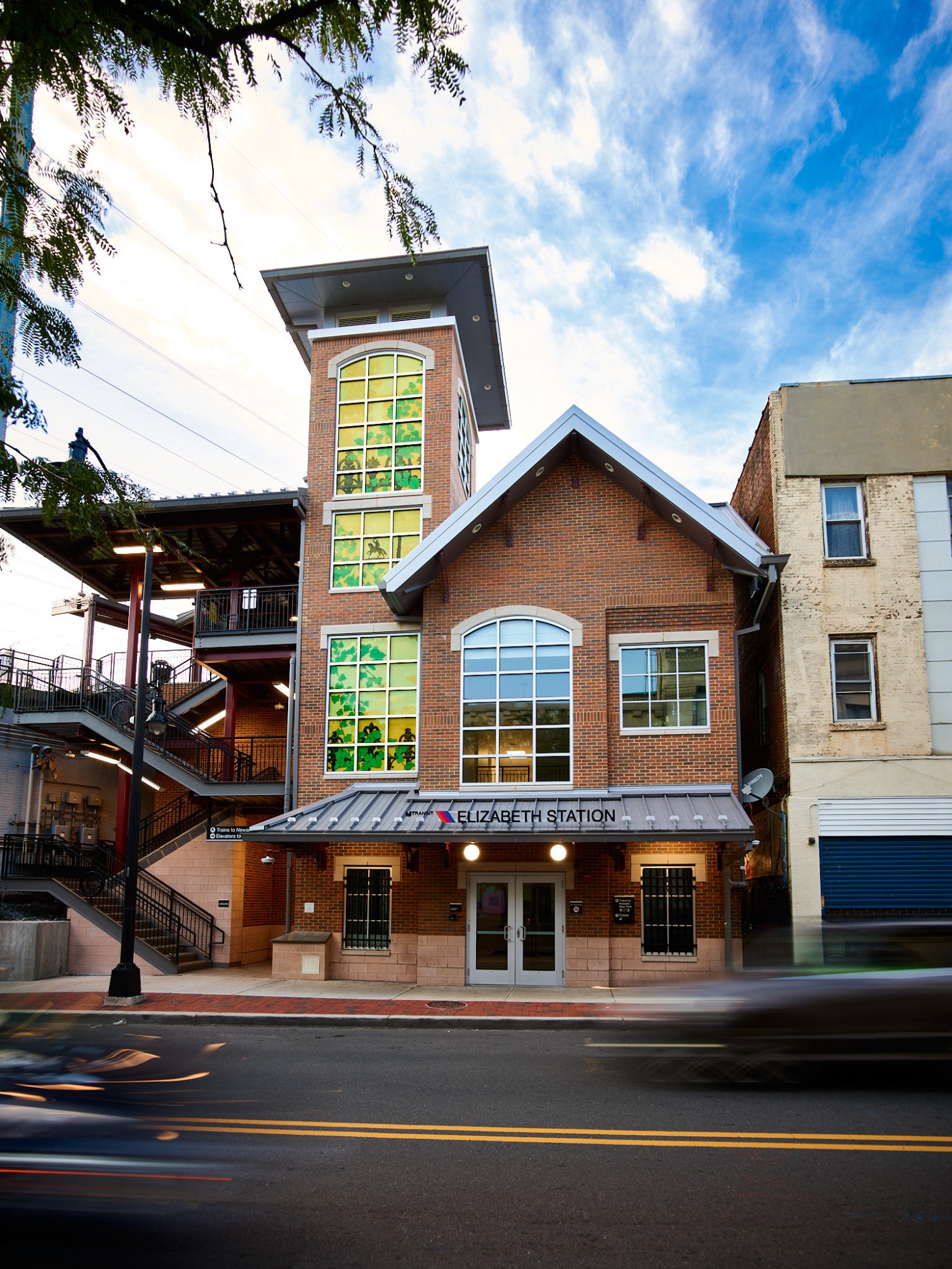 one of four glass elevator towers designed for the Elizabeth Station