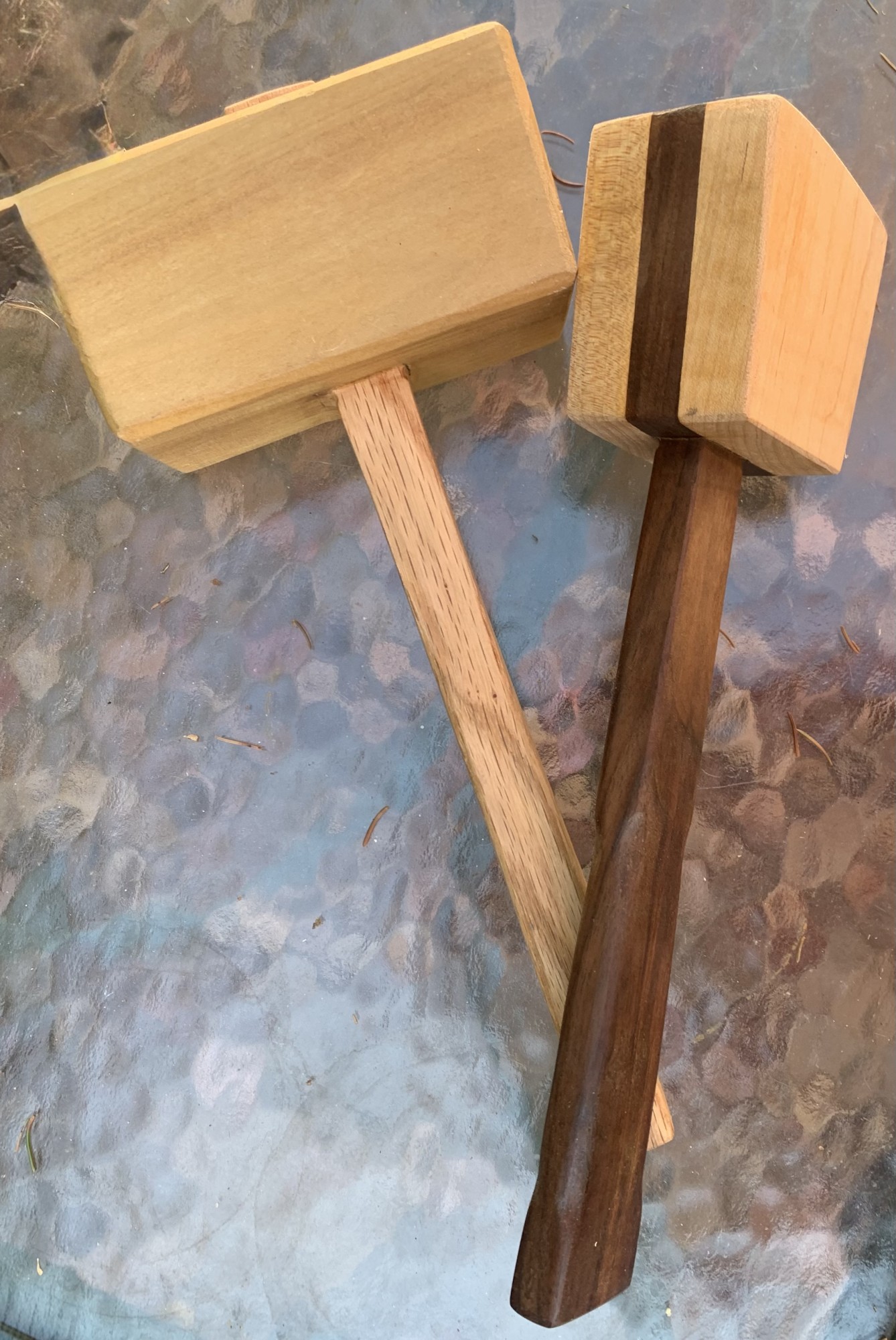 Two mallets, handcrafted with fine wood:  walnut, beech and oak