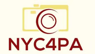 A yellow and red illustration of a camera on a cream colored background, with text in red on the bottom stating 'N Y C 4 P A.'