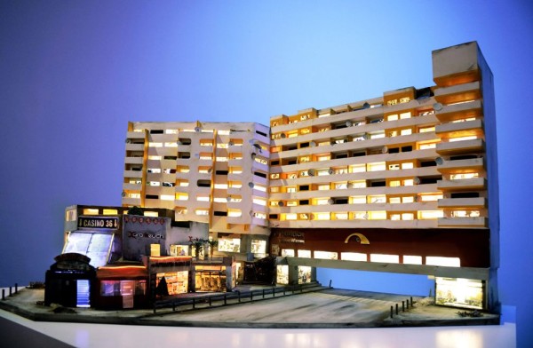 A handmade diorama of a hotel with an attached casino.