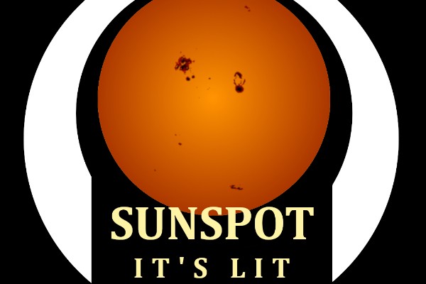 A warm perfect circle of the sun with dark spots on it surrounded by a white band and the words “Sunspot It’s Lit” on the bottom between the ends of the band, all on a field of black.